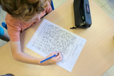 En classe